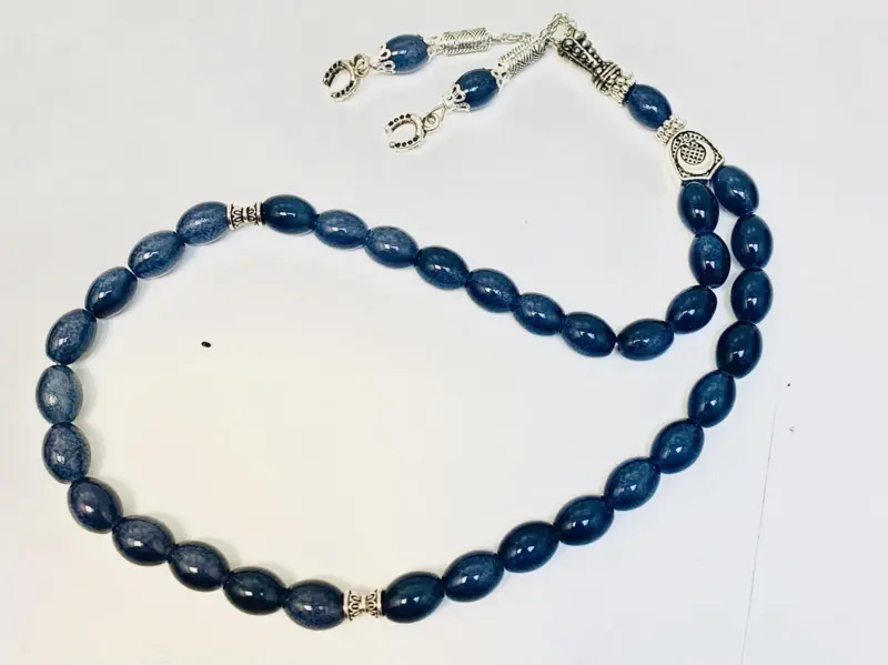Droppformat glas Tasbih med silverdetaljer, 33 pärlor