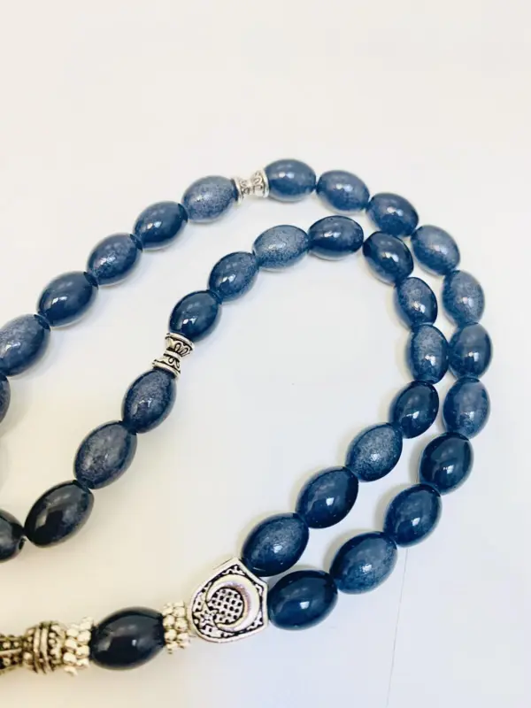 Droppformat glas Tasbih med silverdetaljer, 33 pärlor