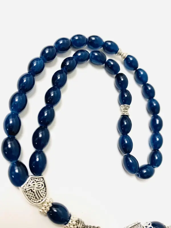 Droppformat glas Tasbih med silverdetaljer, 33 pärlor