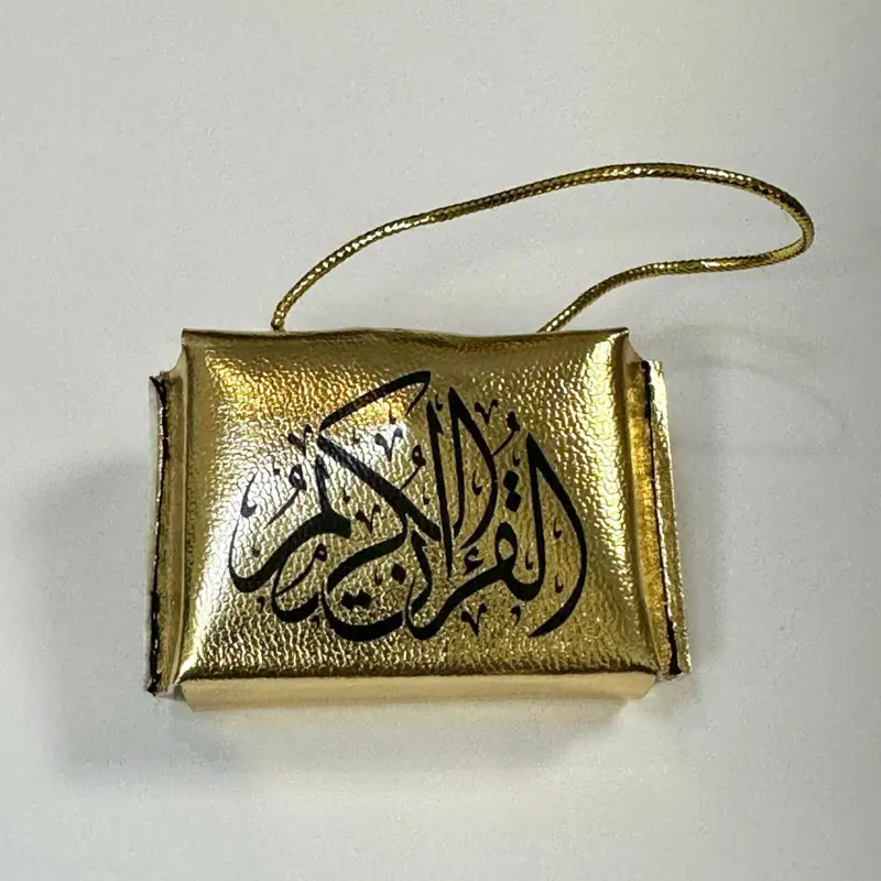 Mini Koran i väska, guld