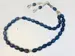 Droppformat glas Tasbih med silverdetaljer, 33 pärlor