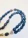 Droppformat glas Tasbih med silverdetaljer, 33 pärlor