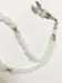 Droppformat glas Tasbih med silverdetaljer, 33 pärlor