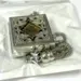 Mini-Koran in Metalldose, Silber