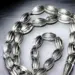 Tasbih aus Metall mit mandelförmigen Perlen, 33 Perlen